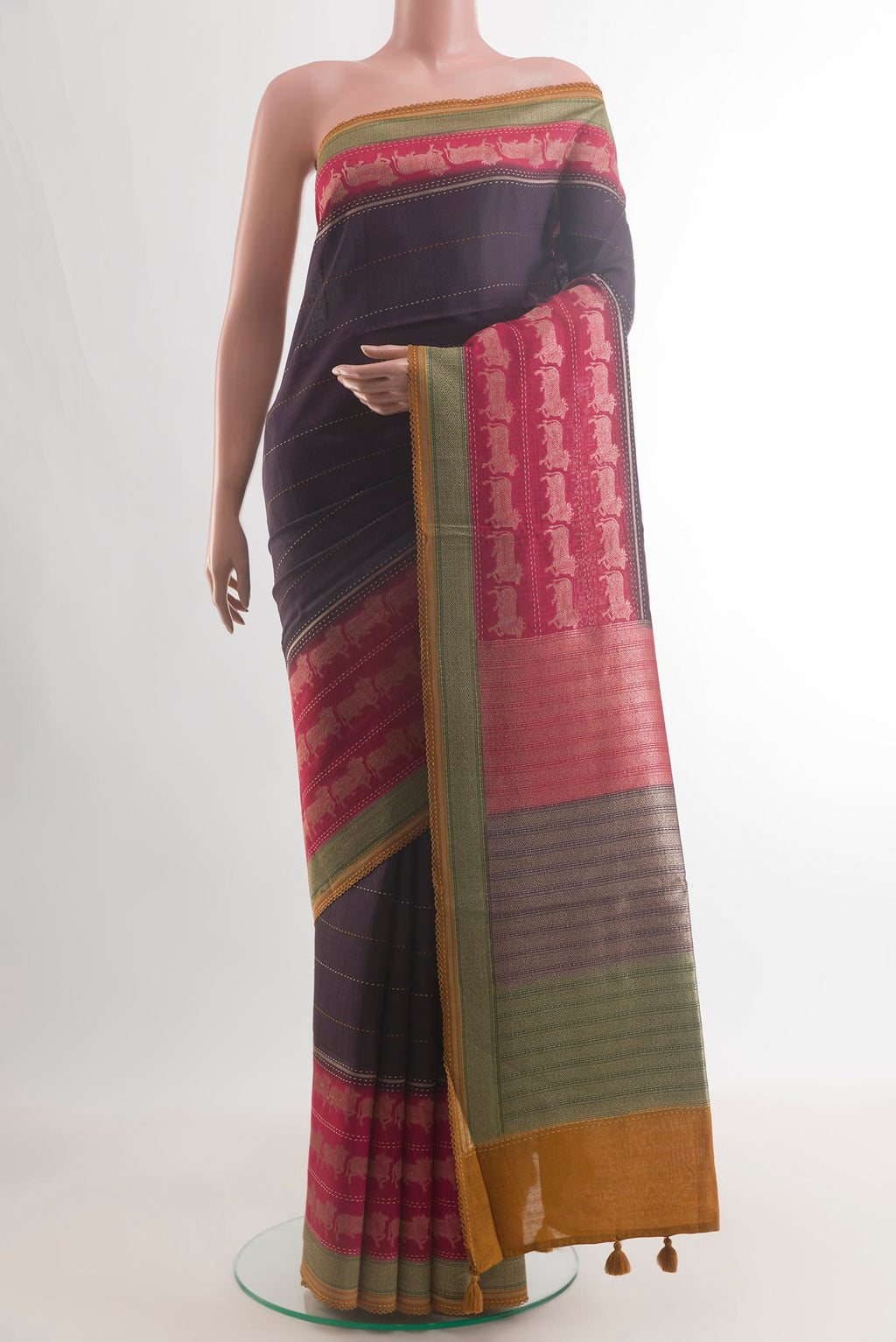 Purple Tussar Saree with Embroidery on the body and Embroidery Border.  displayed on a mannequin