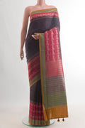 Purple Tussar Saree with Embroidery on the body and Embroidery Border.  displayed on a mannequin