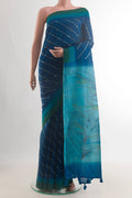 Blue Tussar Saree with Stripes on the body and Thread Embroidery Border.  displayed on a mannequin