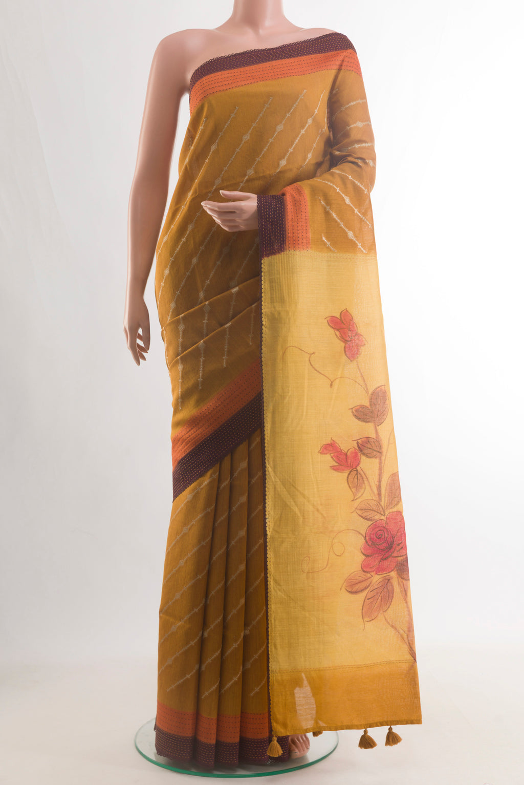Mustard Tussar Saree with Stripes on the body and Thread Embroidery Border.  displayed on a mannequin