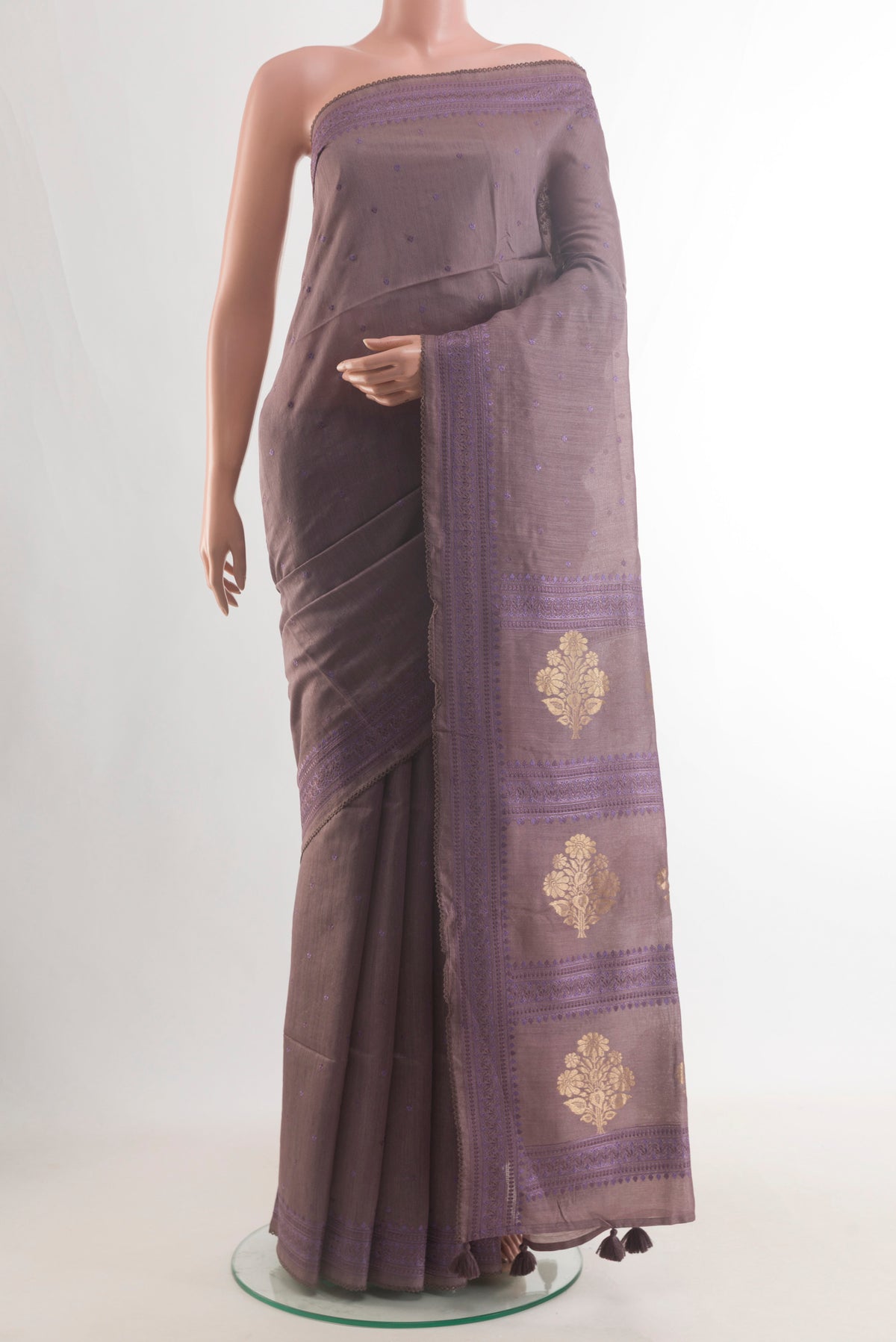 Mauve Tussar Saree with Embroidery on the body and Embroidery Border.  displayed on a mannequin