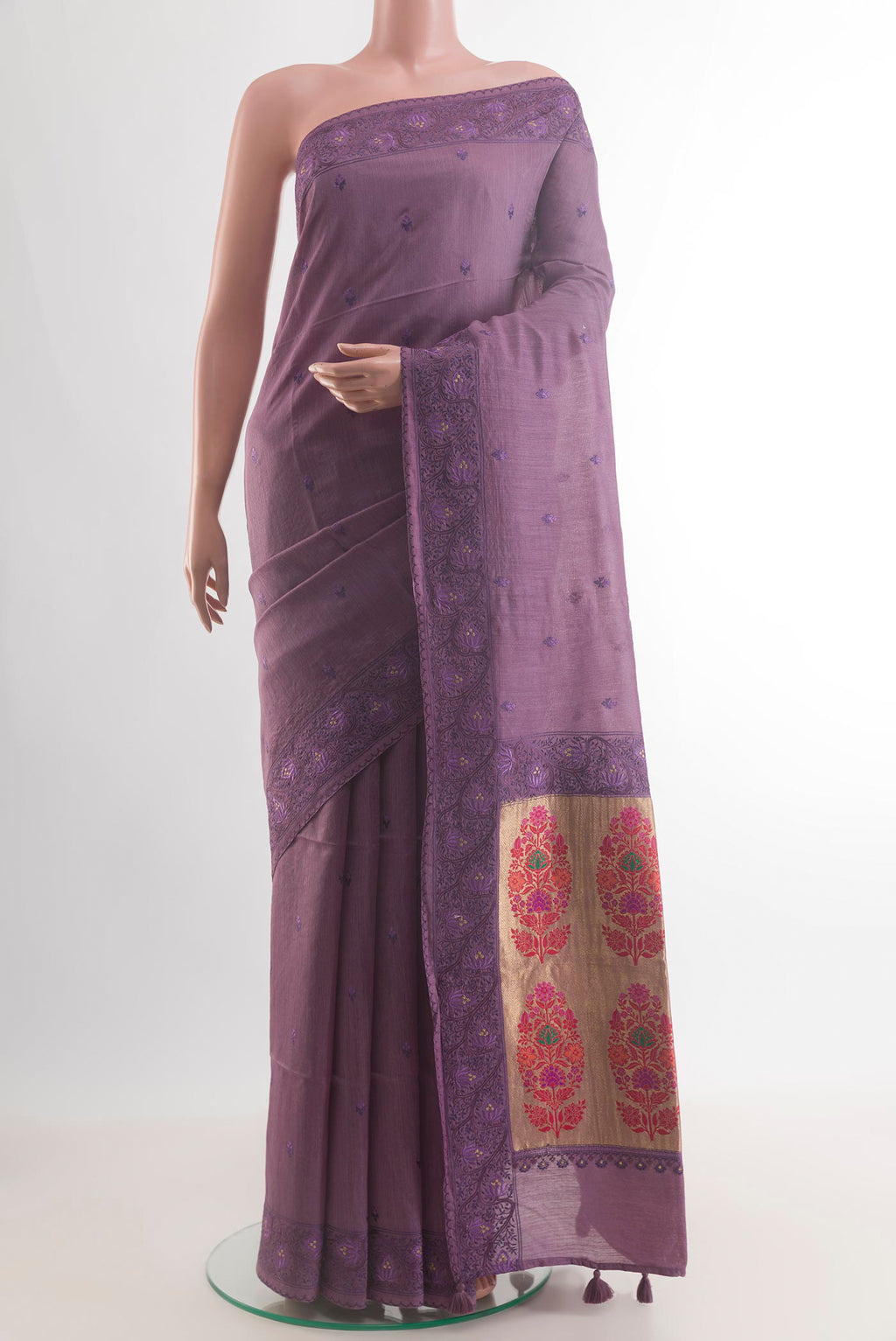 Lavender Tussar Saree with Embroidery on the body and Embroidery Border.  displayed on a mannequin