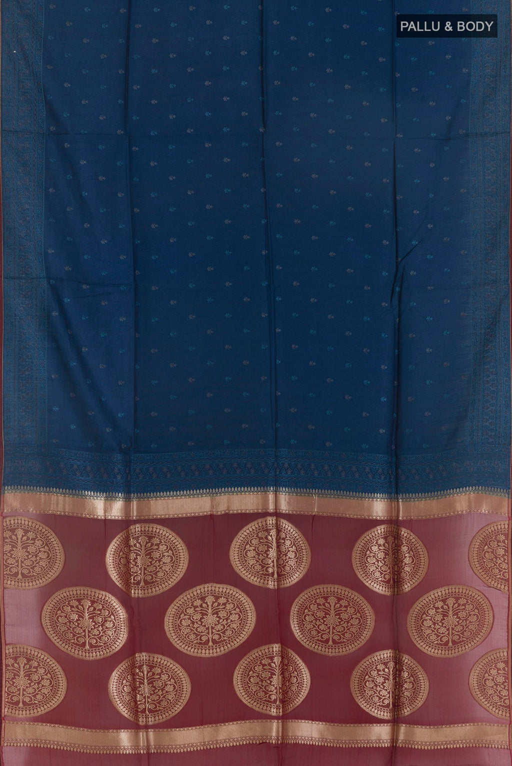 Flat view of Blue Tussar Saree with Embroidery on the body and Embroidery Border. 