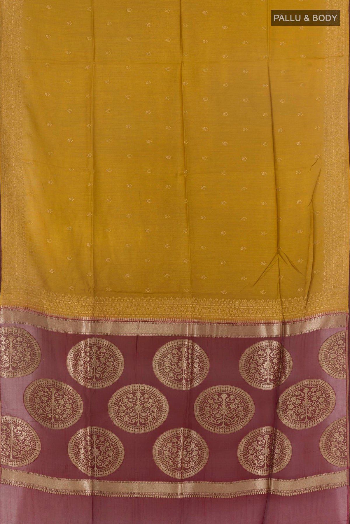 Flat view of Mustard Tussar Saree with Embroidery on the body and Embroidery Border. 