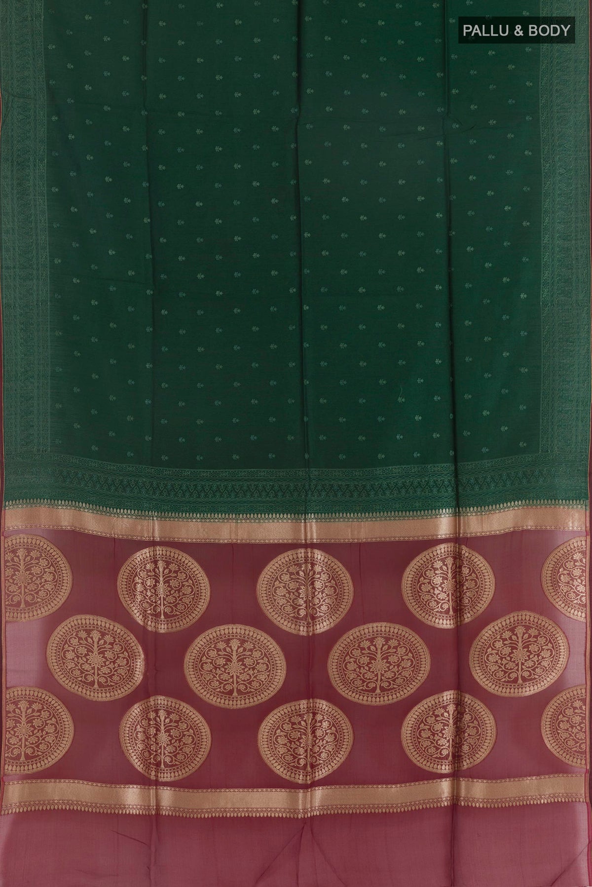 Flat view of Bottle Green Tussar Saree with Embroidery on the body and Embroidery Border. 