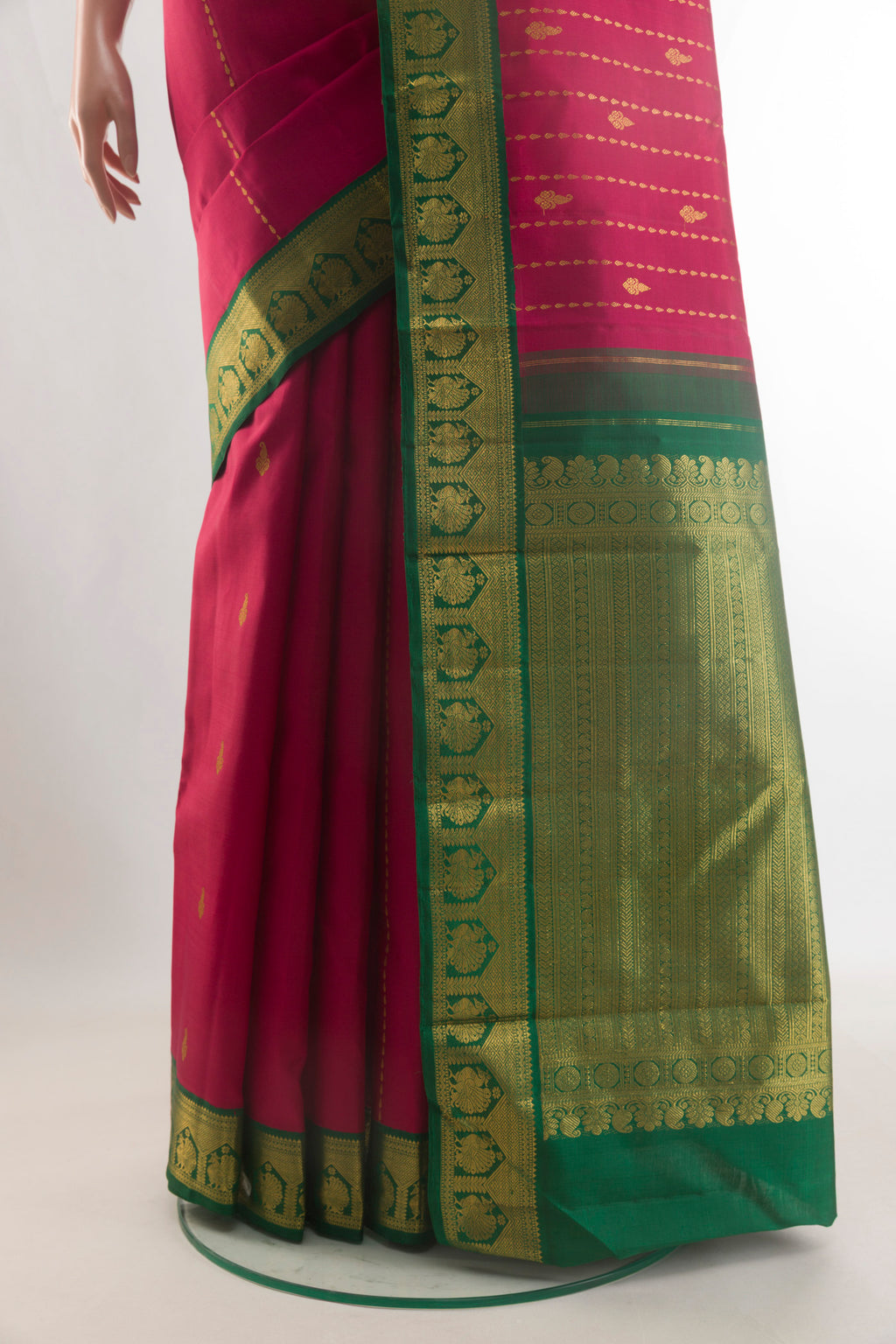 Pleats and pallu of Pure Silk Red Kanjivaram Saree with Zari Butta on the body and Zari Border. 
