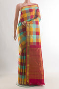 Pure Silk Multi Color Kanchipuram Saree with Checked design on the body and Zari Border.  displayed on a mannequin