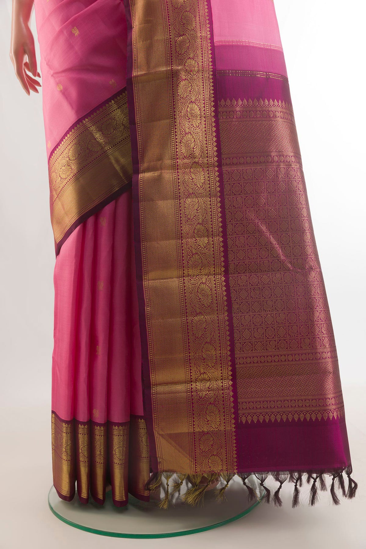 Pleats and pallu of Pure Silk Pink Kanjivaram Saree with Zari Butta on the body and Zari Border. 