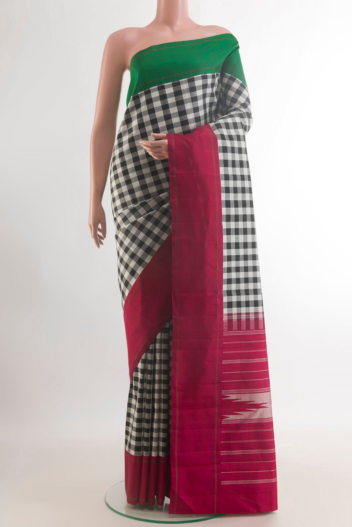 Pure Silk Multi Color Kanjivaram Saree with Checked design on the body and Ganga Jamuna Border.  displayed on a mannequin
