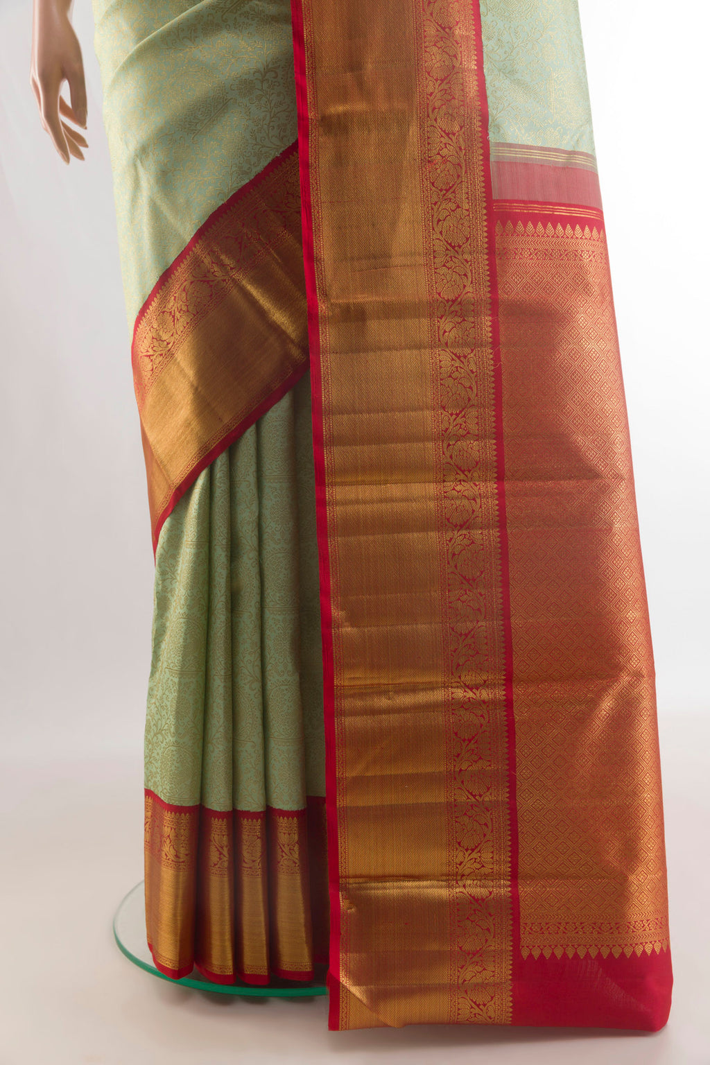 Pleats and pallu of Pure Silk Light Green Kanchipuram Saree with Zari Brocade on the body and Zari Border. 