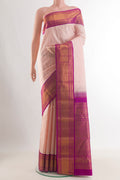 Pure Silk Peach Kanjivaram Saree with Plain Body and Zari Border.  displayed on a mannequin