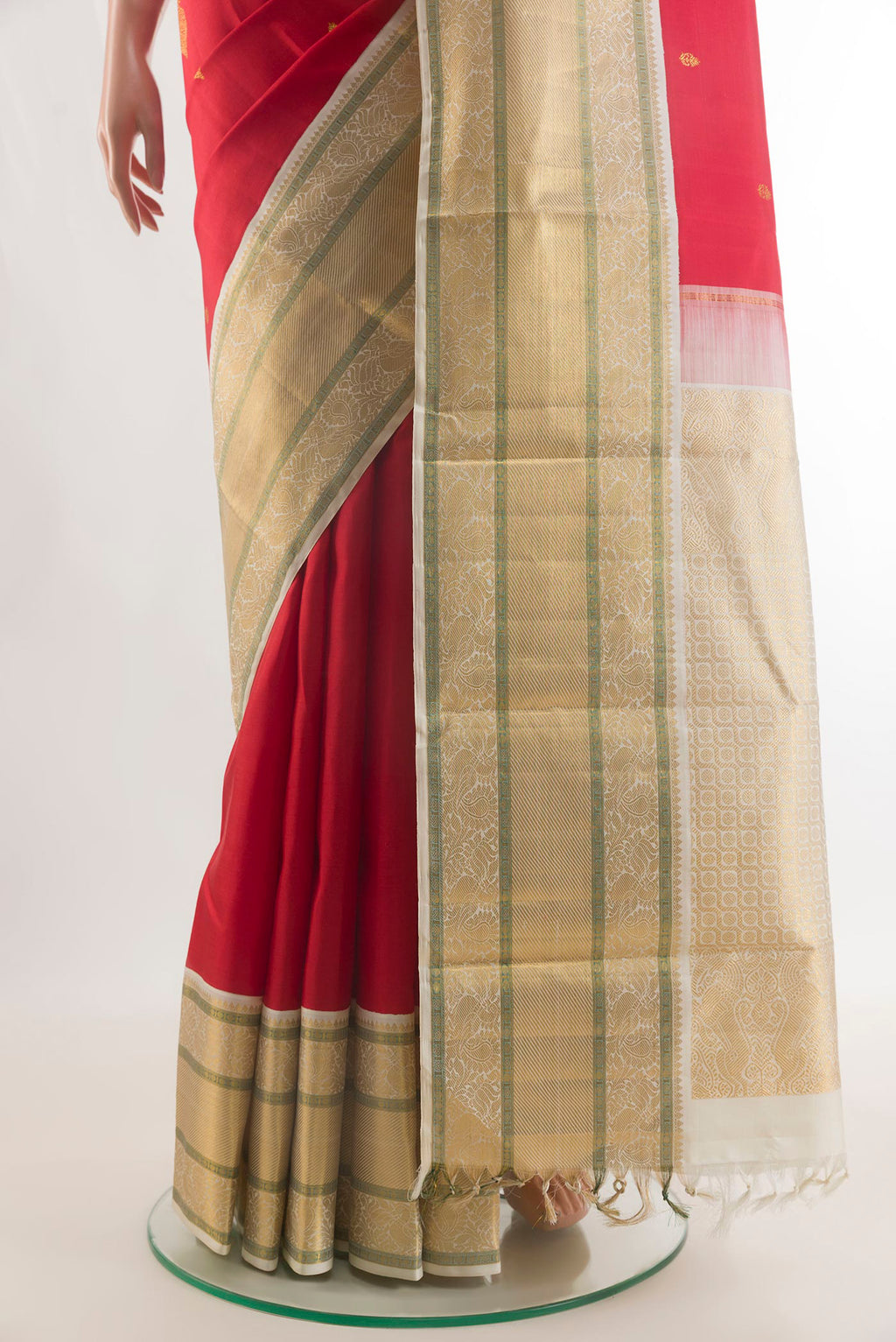 Pleats and pallu of Pure Silk Red Kanjivaram Saree with Zari Butta on the body and Zari Border. 