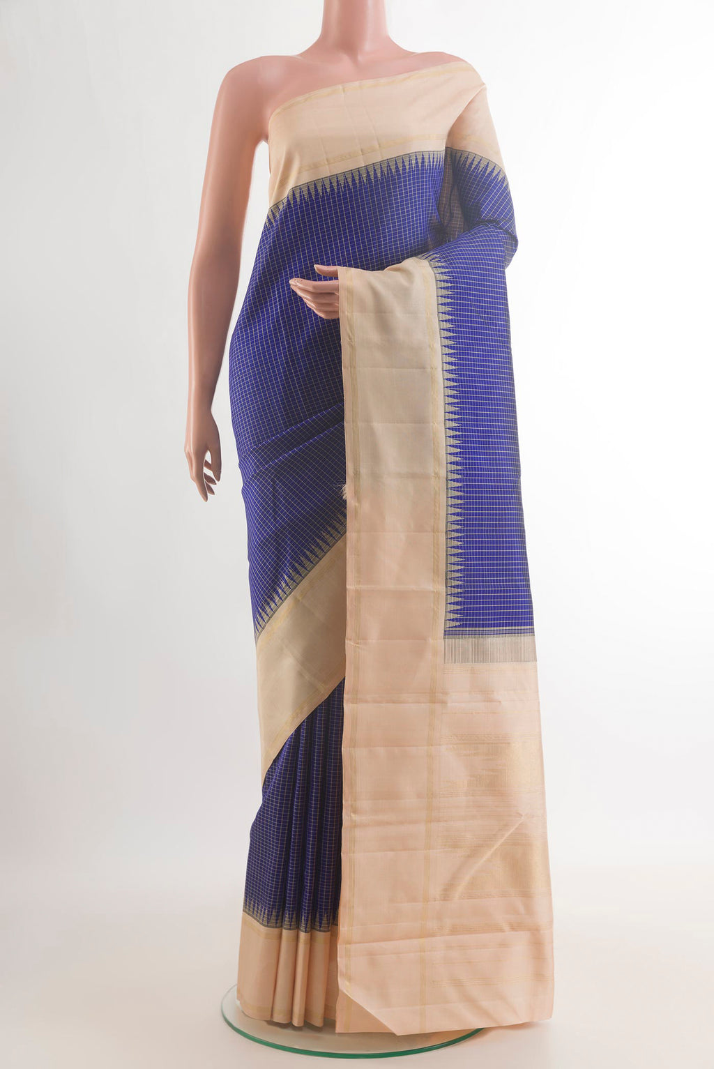Pure Silk Blue Kanjivaram Saree with Checked design on the body and Zari Border.  displayed on a mannequin