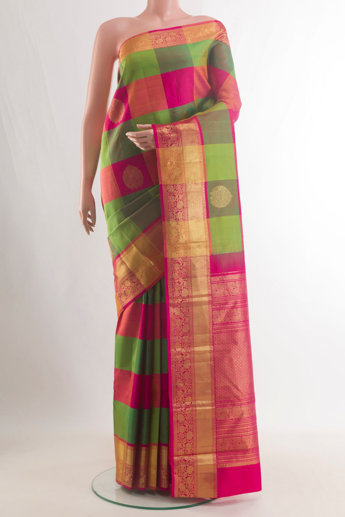 Pure Silk Multi Color Kanjivaram Saree with Checked design on the body and Zari Border.  displayed on a mannequin