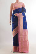Pure Silk Blue Kanchipuram Saree with Zari Butta on the body and Zari Border.  displayed on a mannequin