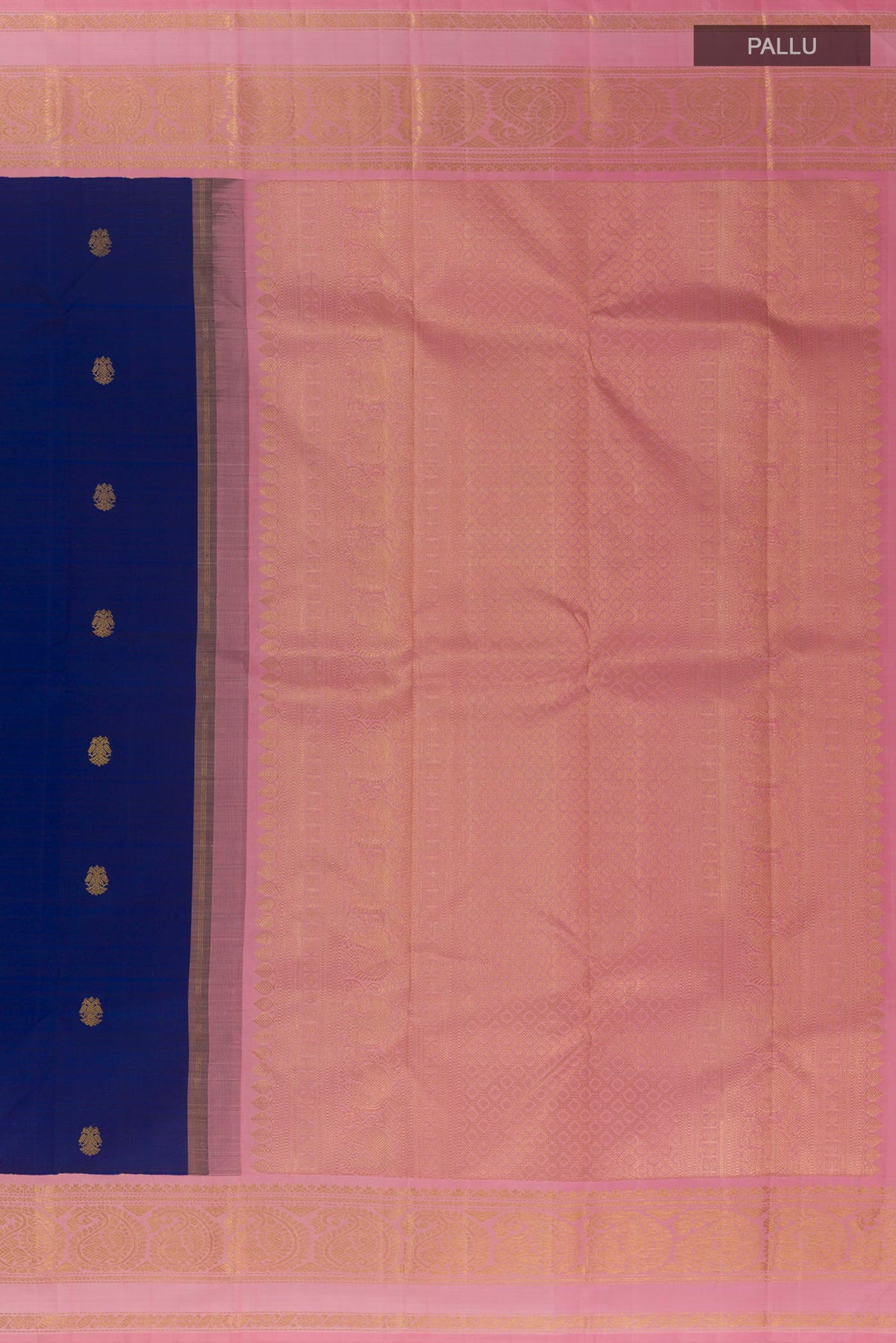 Close up image of the pallu of Pure Silk Blue Kanchipuram Saree with Zari Butta on the body and Zari Border. 