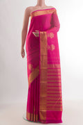 Pure Silk Pink Kanjivaram Saree with Zari Butta on the body and Zari Border.  displayed on a mannequin