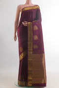 Pure Silk Coffee Brown Kanjivaram Saree with Zari Butta on the body and Zari Border.  displayed on a mannequin