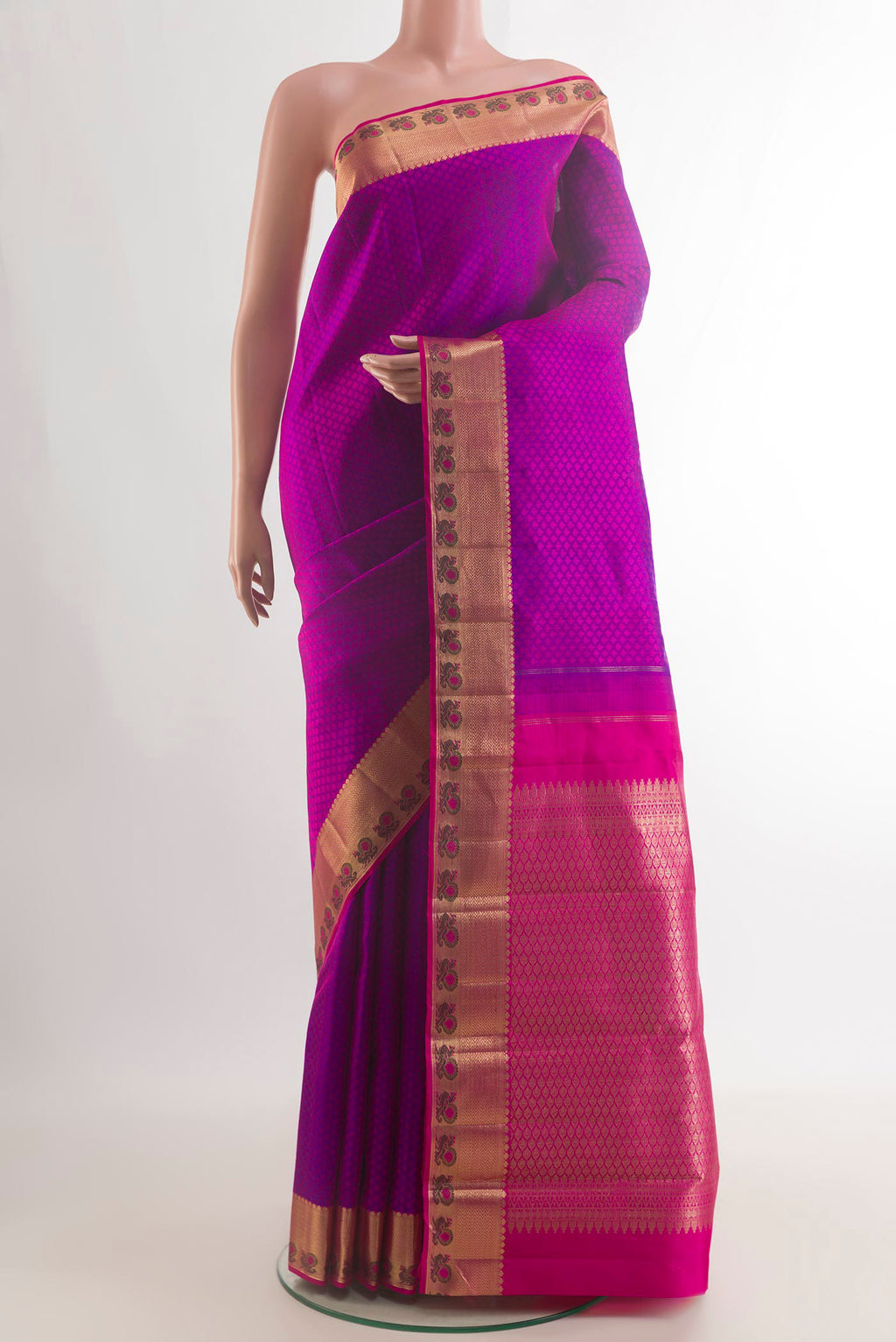 Pure Silk Purple Kanchipuram Saree with Jacquard design on the body and Zari Border.  displayed on a mannequin