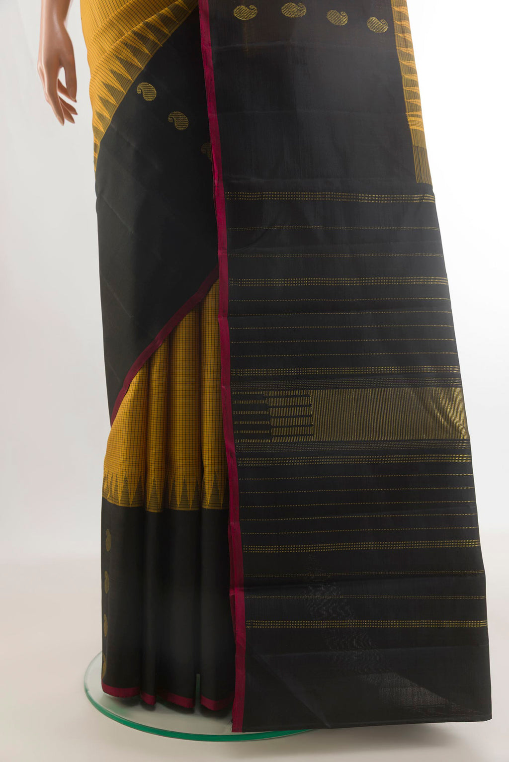Pleats and pallu of Pure Silk Yellow Kanjivaram Saree with Checked design on the body and Fancy Border. 