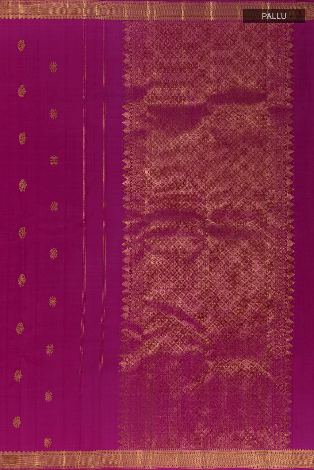 Close up image of the pallu of Pure Silk Magenta Kanchipuram Saree with Zari Butta on the body and Zari Border. 