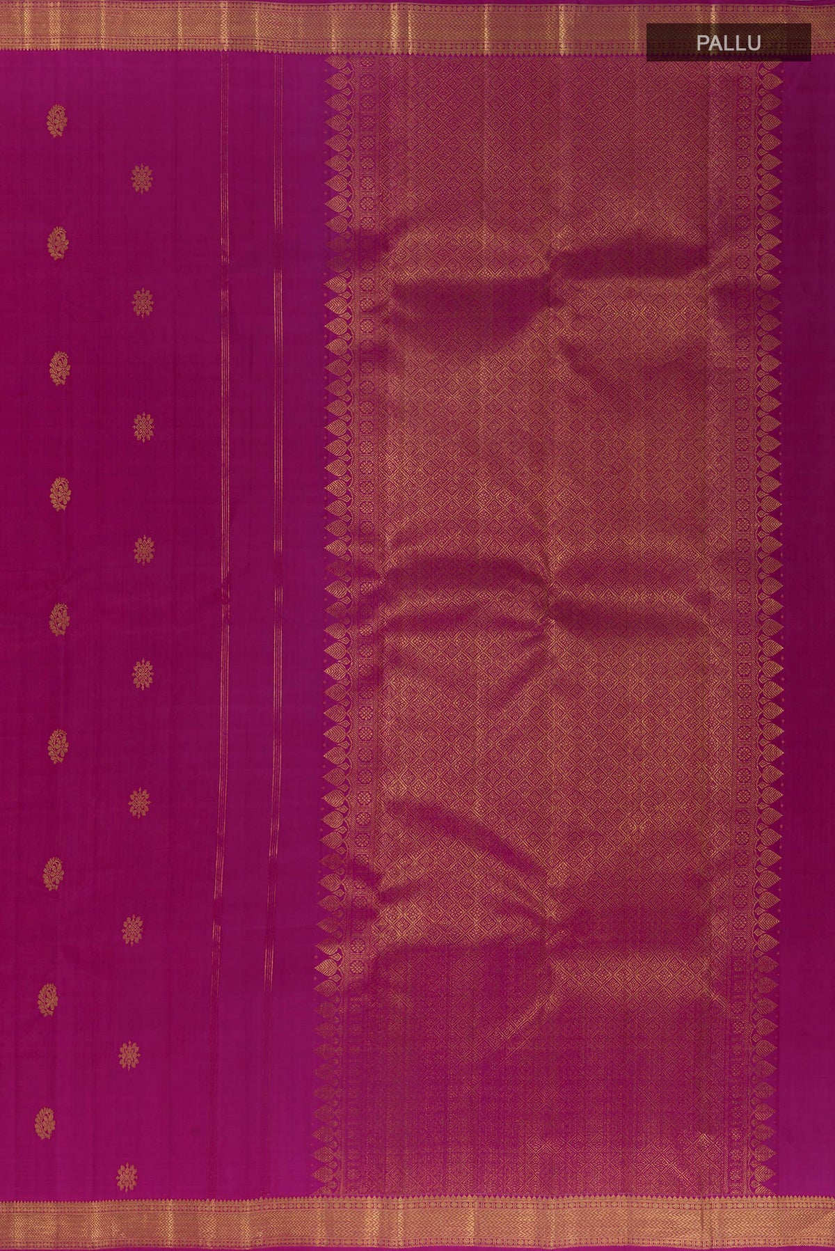 Close up image of the pallu of Pure Silk Magenta Kanchipuram Saree with Zari Butta on the body and Zari Border. 