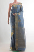 Pure Silk Blue Grey Kanchipuram Saree with Zari Butta on the body and Zari Border.  displayed on a mannequin