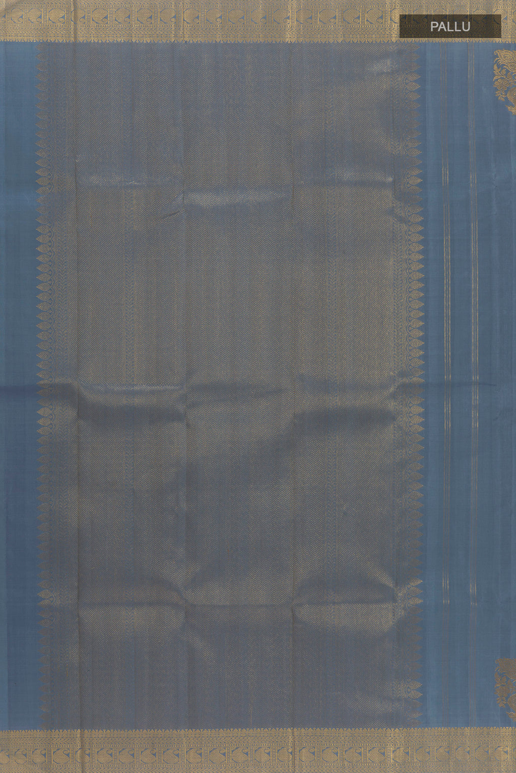 Close up image of the pallu of Pure Silk Blue Grey Kanchipuram Saree with Zari Butta on the body and Zari Border. 