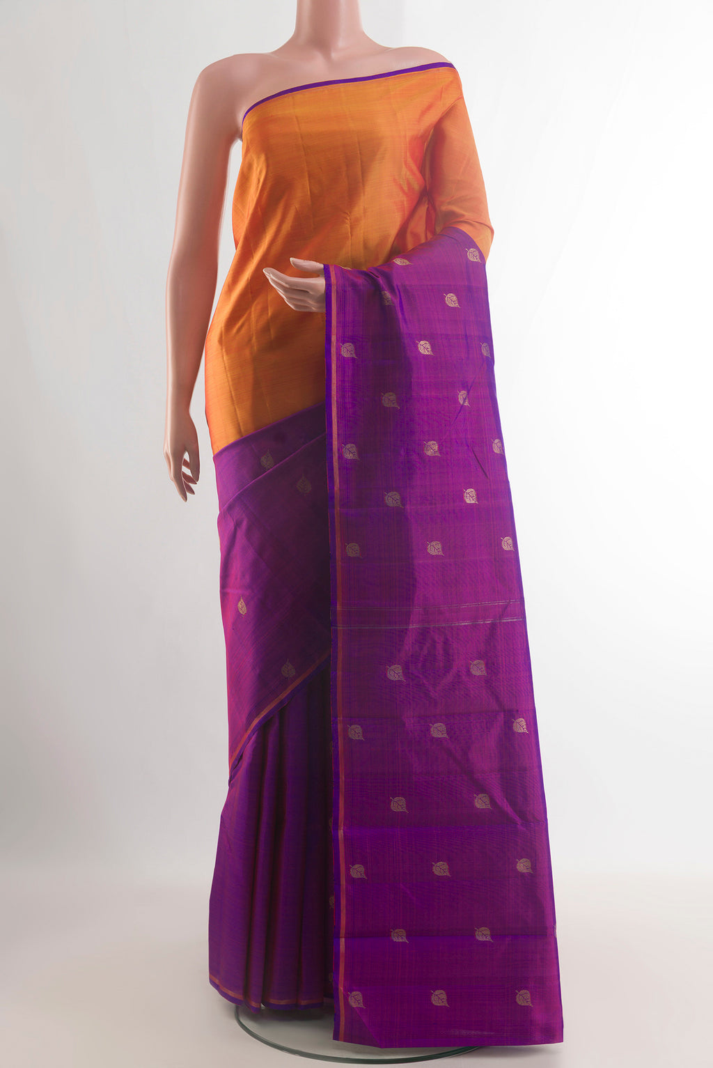 Pure Silk Multi Color Kanjivaram Saree with Half And Half on the body and Without Border.  displayed on a mannequin