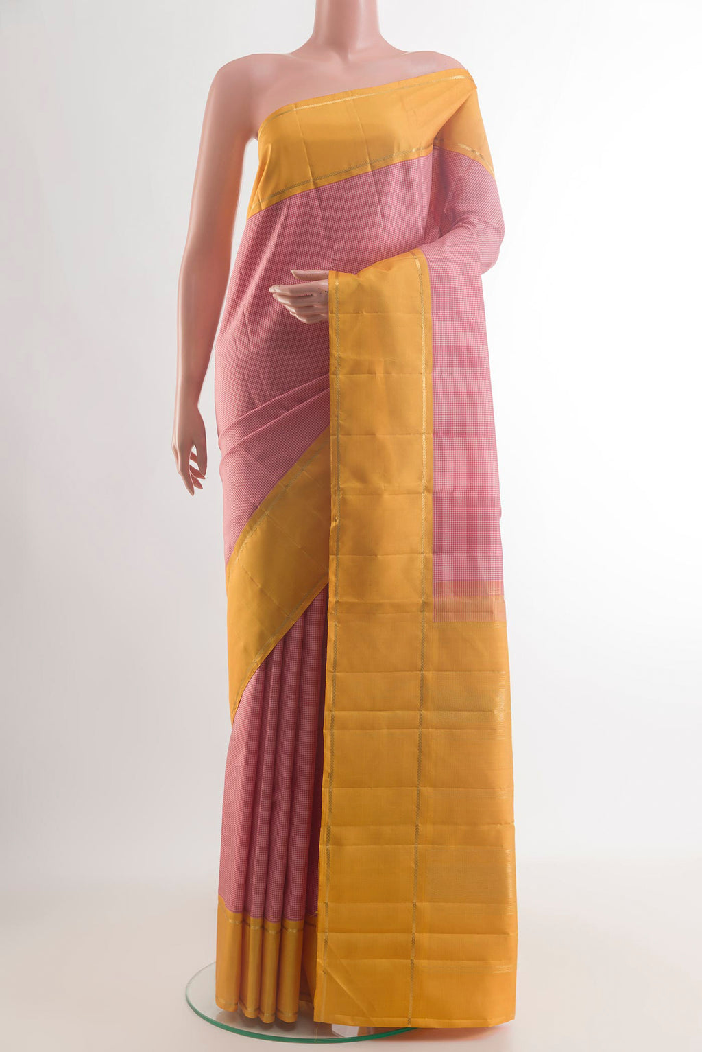 Pure Silk Pink Kanjivaram Saree with Checked design on the body and Zari Border.  displayed on a mannequin