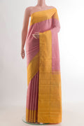 Pure Silk Pink Kanjivaram Saree with Checked design on the body and Zari Border.  displayed on a mannequin