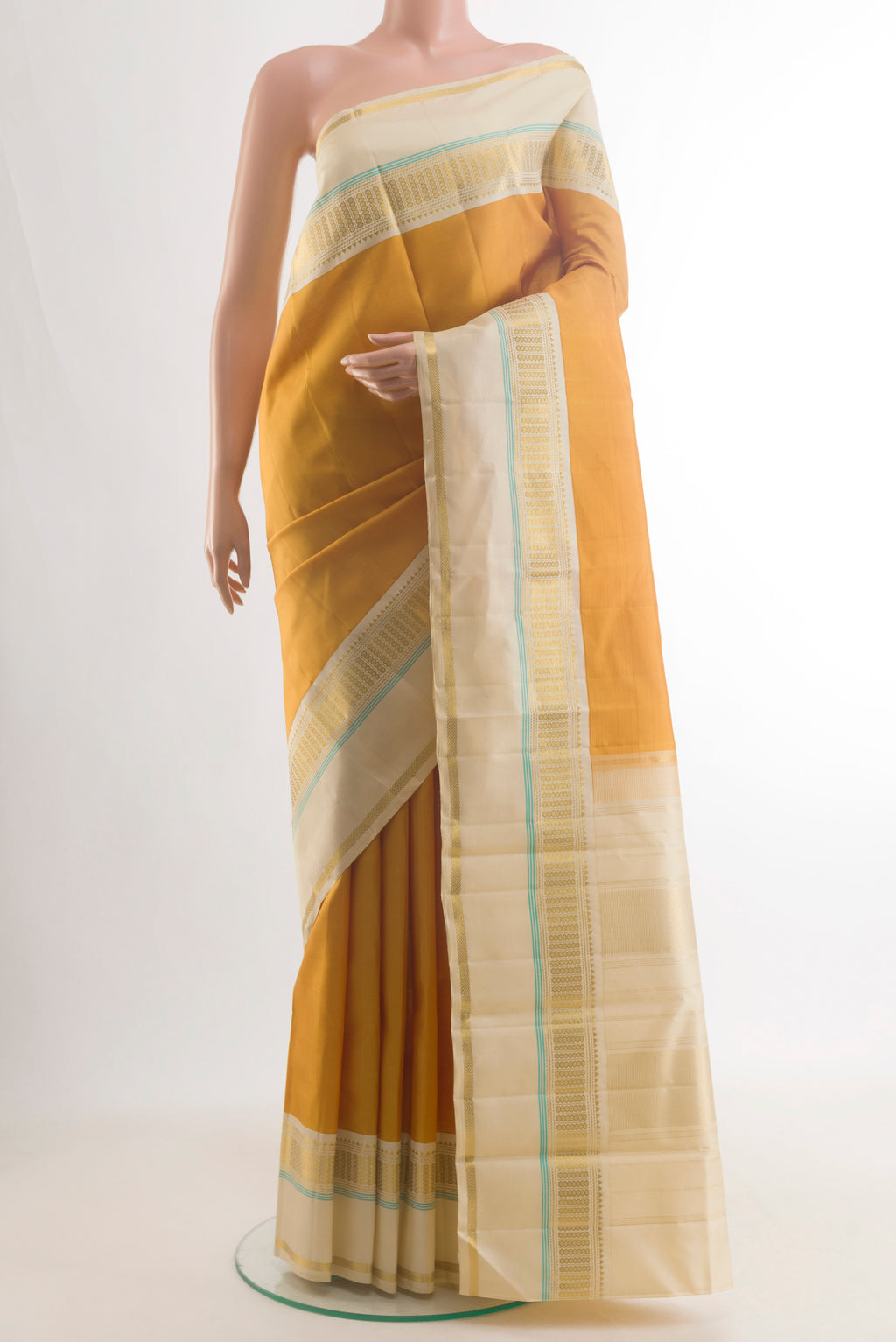 Pure Silk Yellow Kanjivaram Saree with Plain Body and Zari Border.  displayed on a mannequin