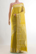 Pure Silk Yellow Kanjivaram Saree with Thread Butta on the body and Thread Border.  displayed on a mannequin