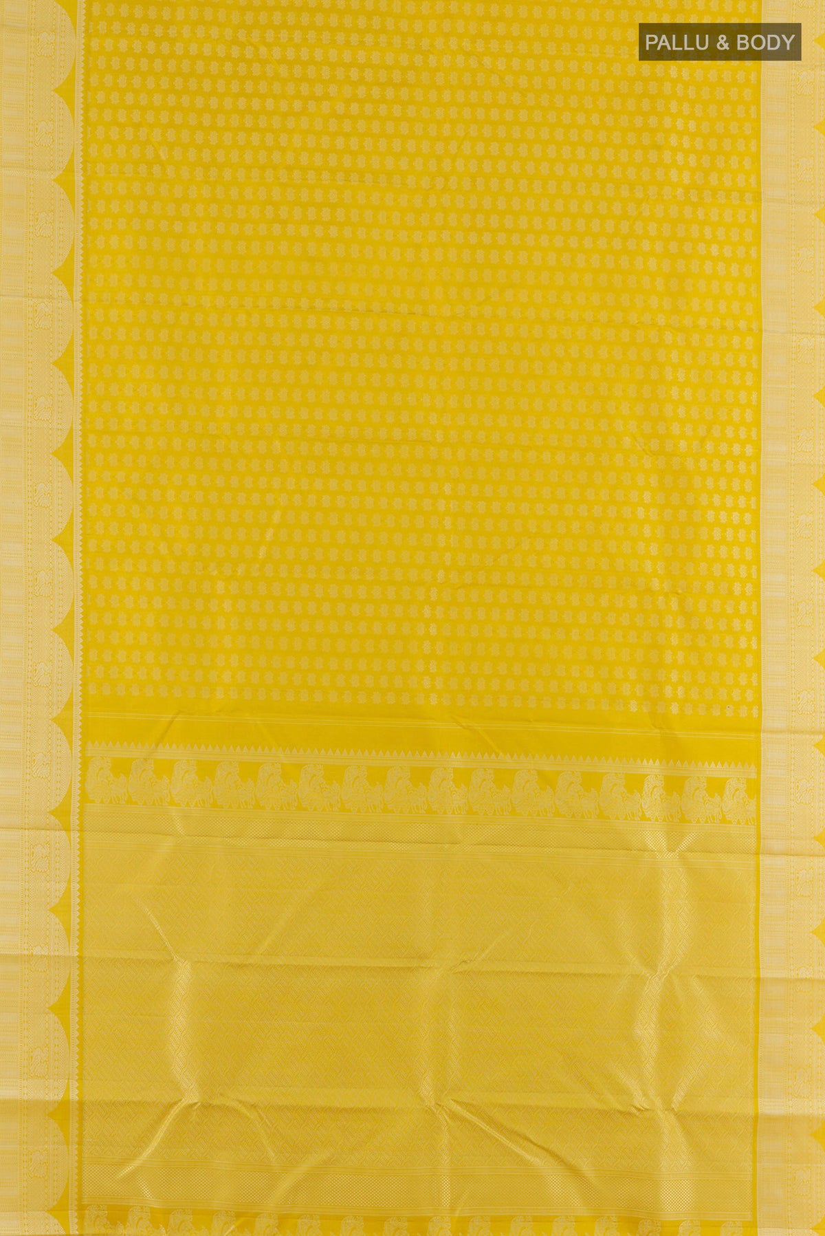 Flat view of Pure Silk Yellow Kanjivaram Saree with Thread Butta on the body and Thread Border. 