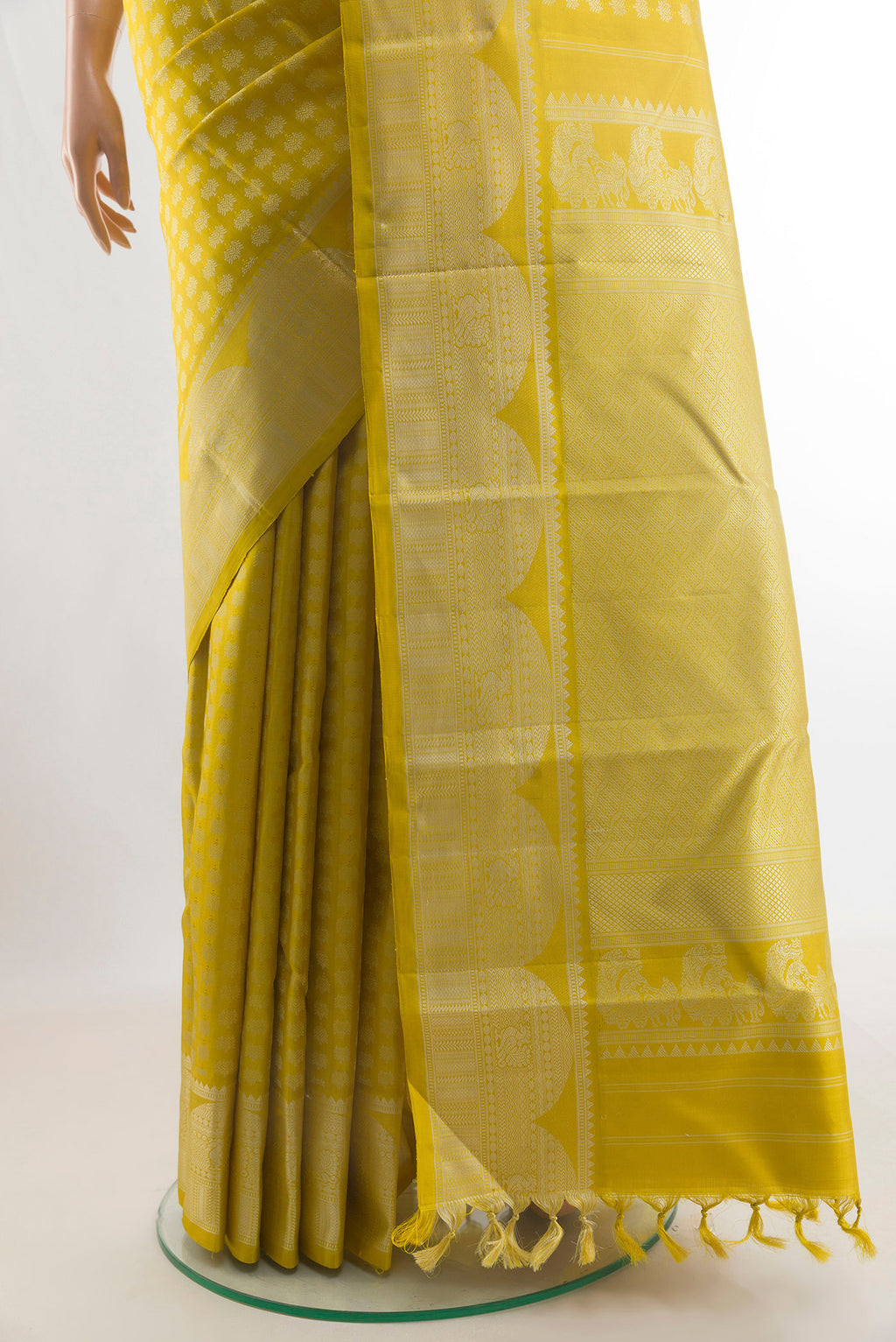 Pleats and pallu of Pure Silk Yellow Kanjivaram Saree with Thread Butta on the body and Thread Border. 
