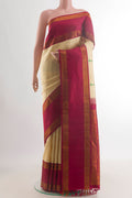 Pure Silk Sandal Kanjivaram Saree with Thread Butta on the body and Zari Border.  displayed on a mannequin