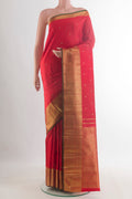 Pure Silk Pure Zari Red Kanjivaram Saree with Zari Butta on the body and Zari Border.  displayed on a mannequin