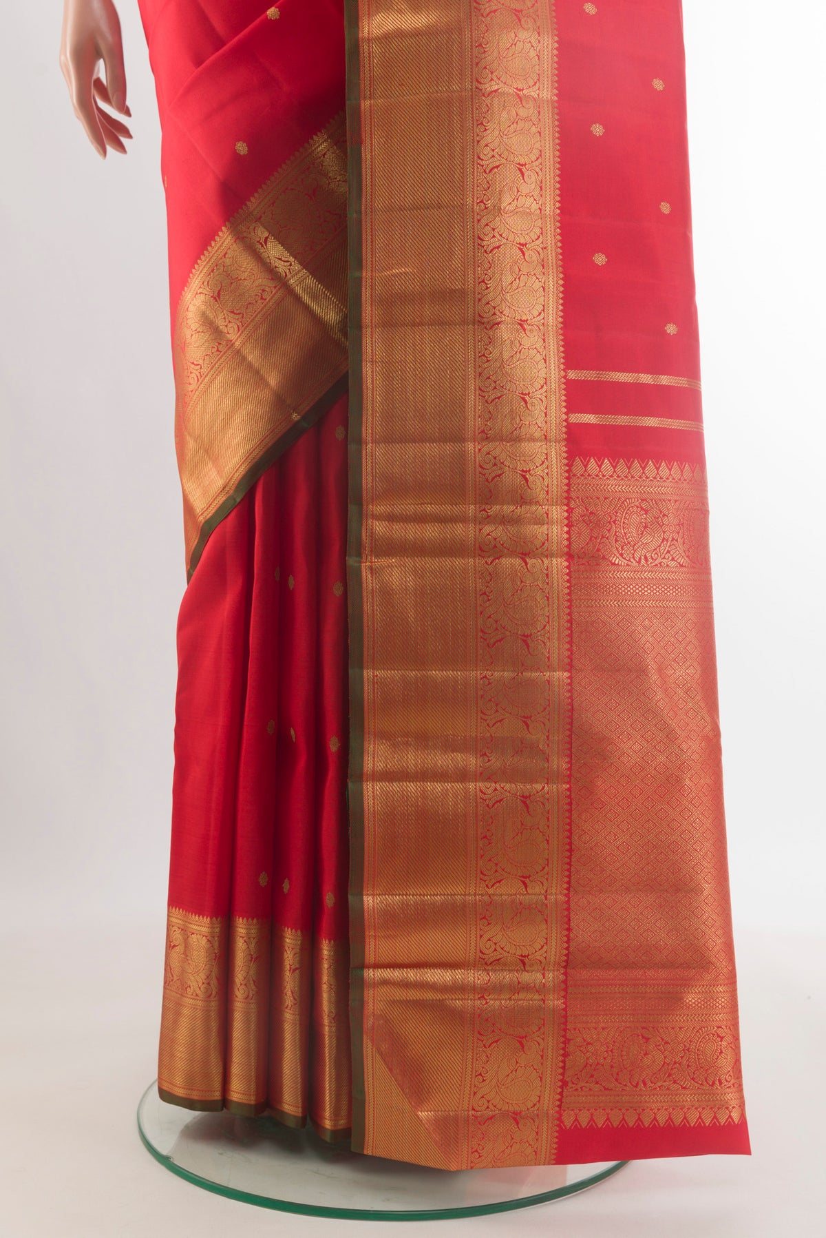 Pleats and pallu of Pure Silk Pure Zari Red Kanjivaram Saree with Zari Butta on the body and Zari Border. 