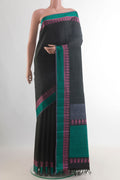Pure Silk Black Kanchipuram Saree with Plain Body and Thread Border.  displayed on a mannequin