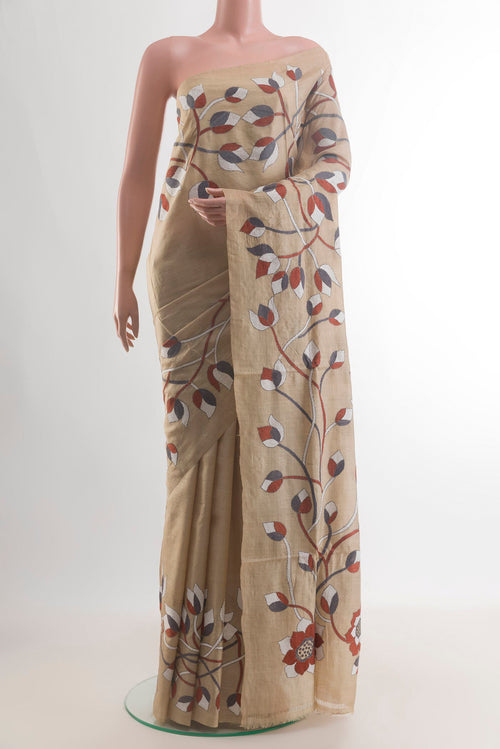 Beige Tussar Saree with Kantha Work on the body and Without Border.  displayed on a mannequin