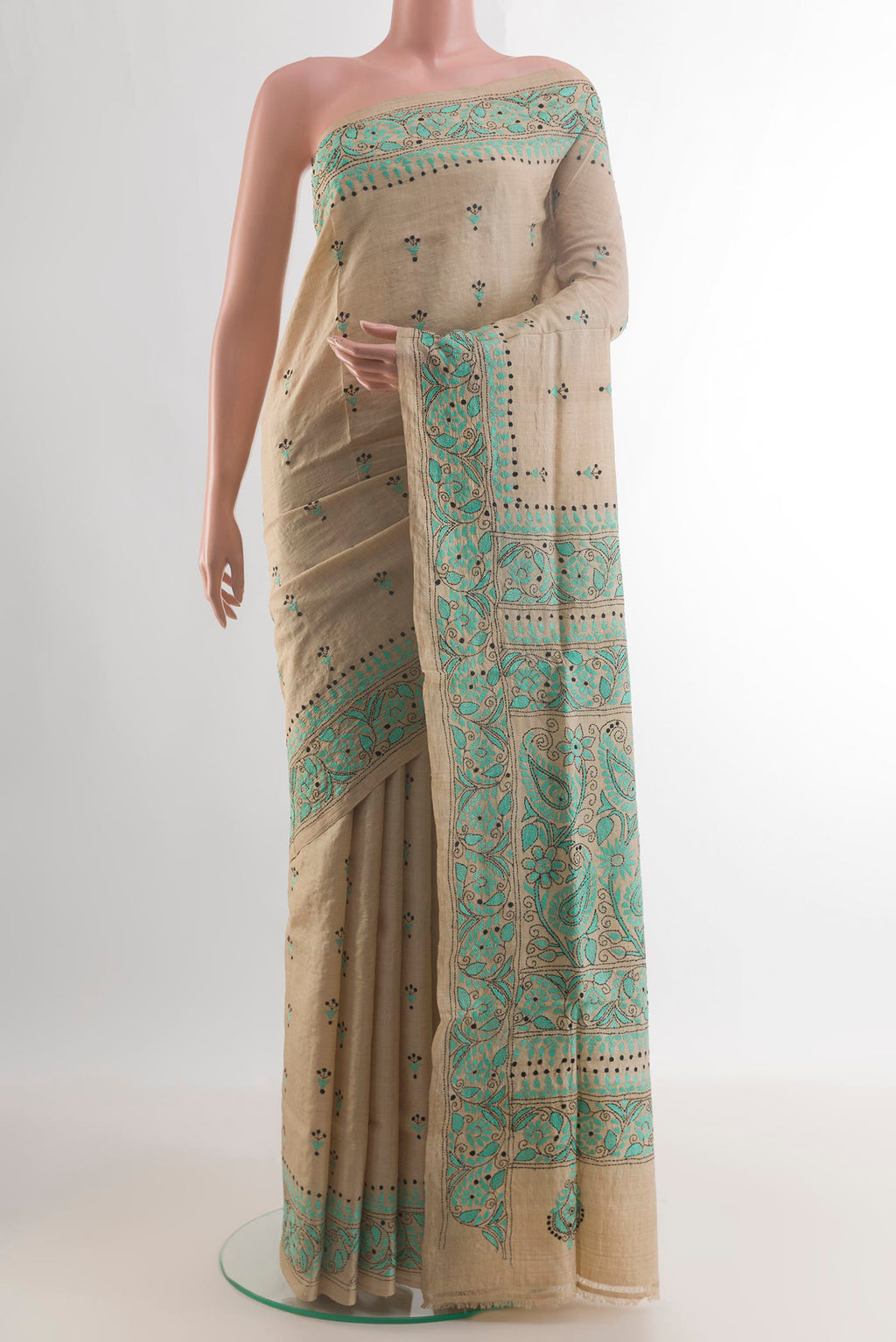 Beige Tussar Saree with Kantha Work on the body and Embroidery Border.  displayed on a mannequin