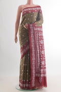 Green Tussar Saree with Kantha Work on the body and Embroidery Border.  displayed on a mannequin