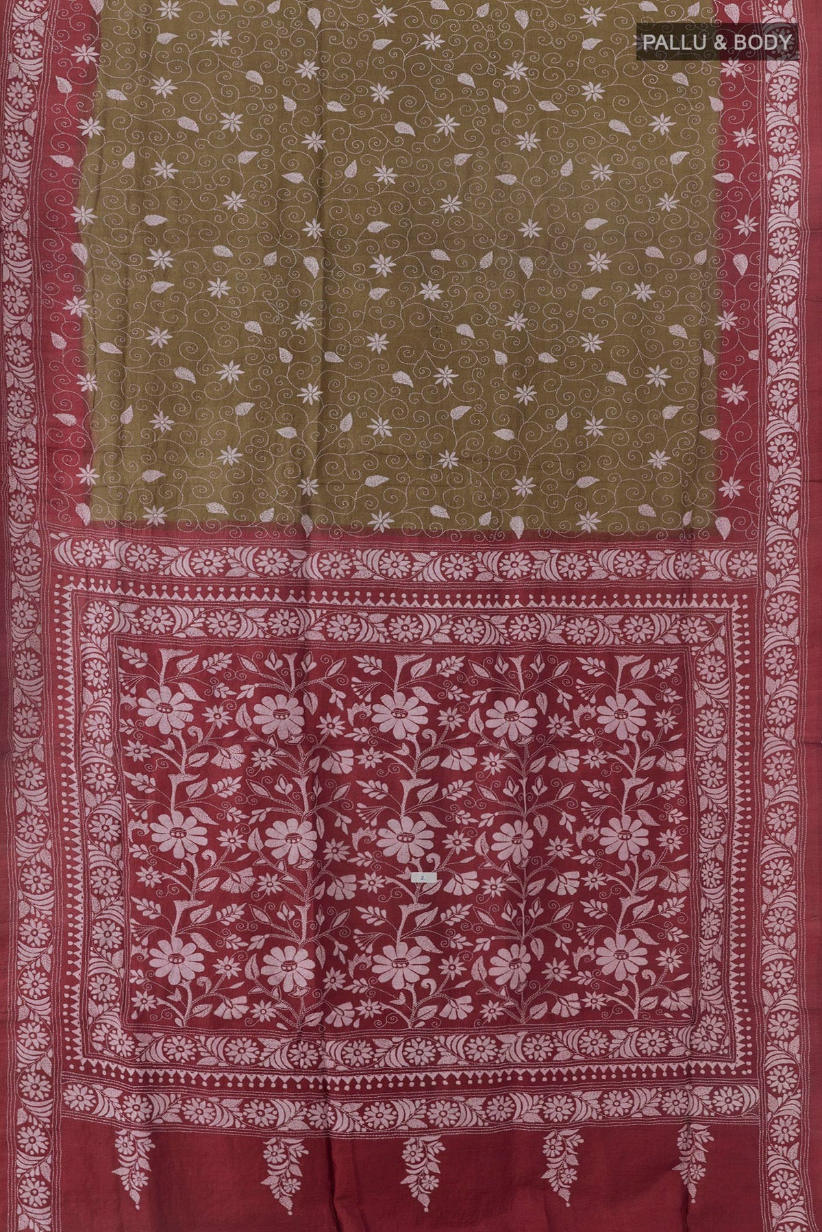 Flat view of Green Tussar Saree with Kantha Work on the body and Embroidery Border. 