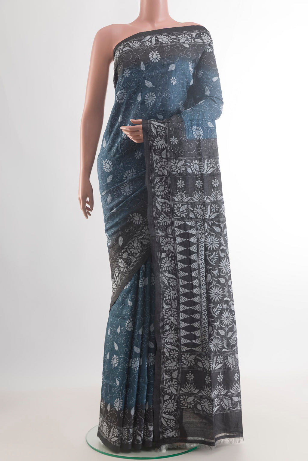 Blue Tussar Saree with Kantha Work on the body and Embroidery Border.  displayed on a mannequin