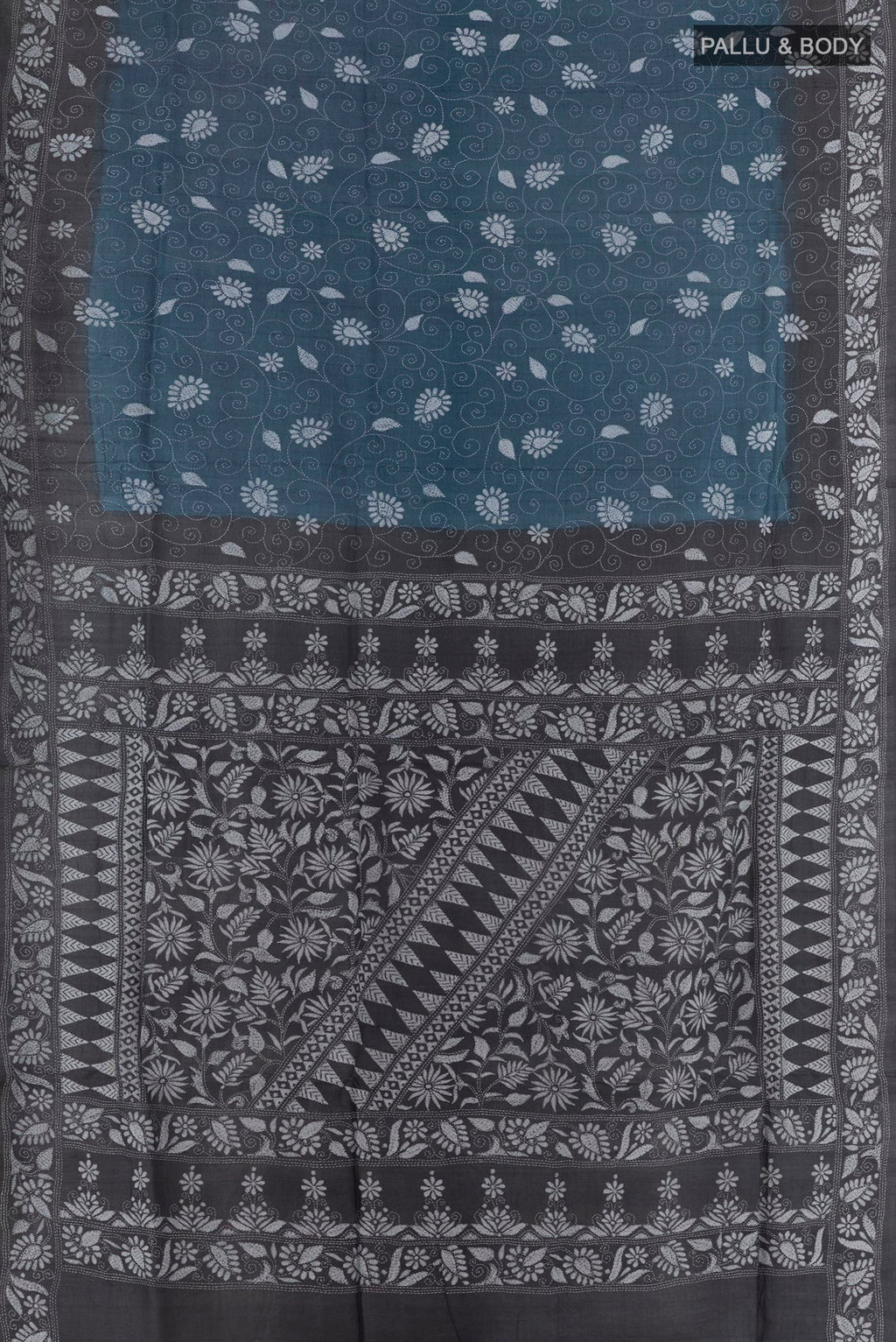 Flat view of Blue Tussar Saree with Kantha Work on the body and Embroidery Border. 