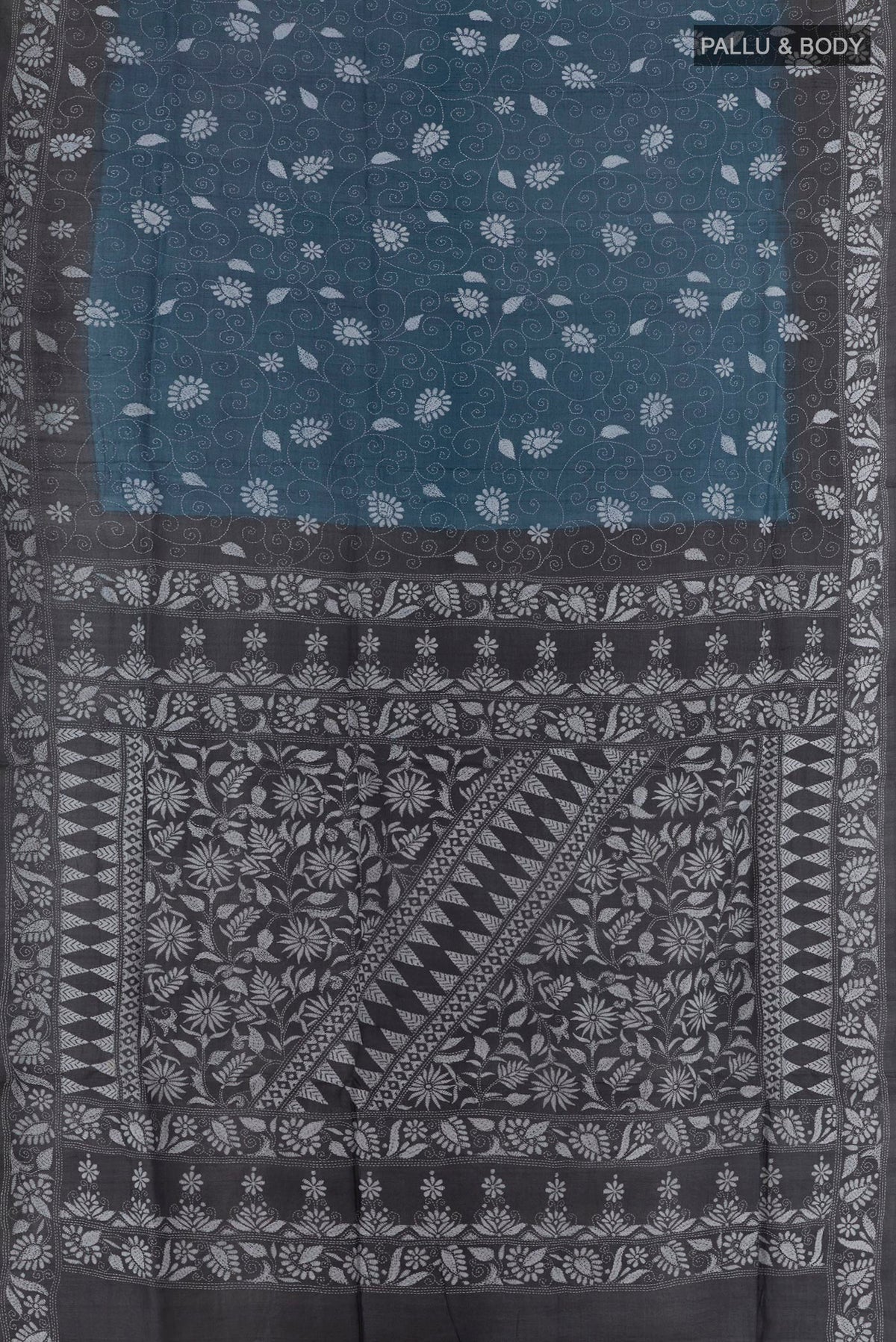 Flat view of Blue Tussar Saree with Kantha Work on the body and Embroidery Border. 