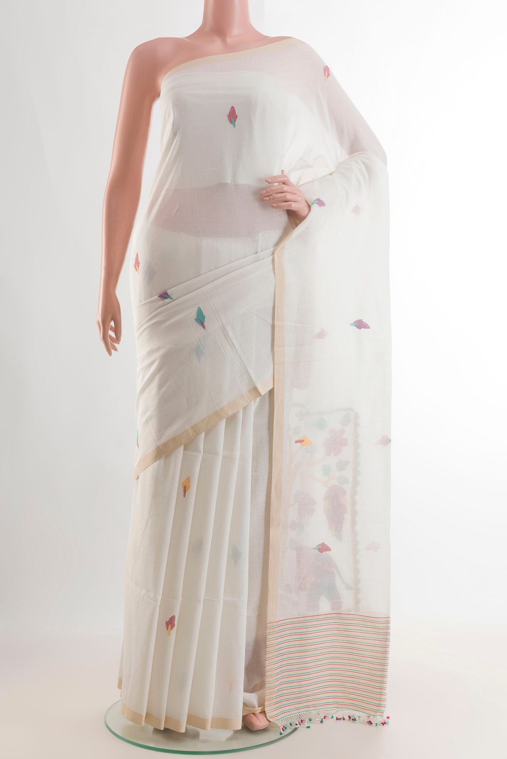 White Cotton Saree with Thread Butta on the body and Plain Border.  displayed on a mannequin
