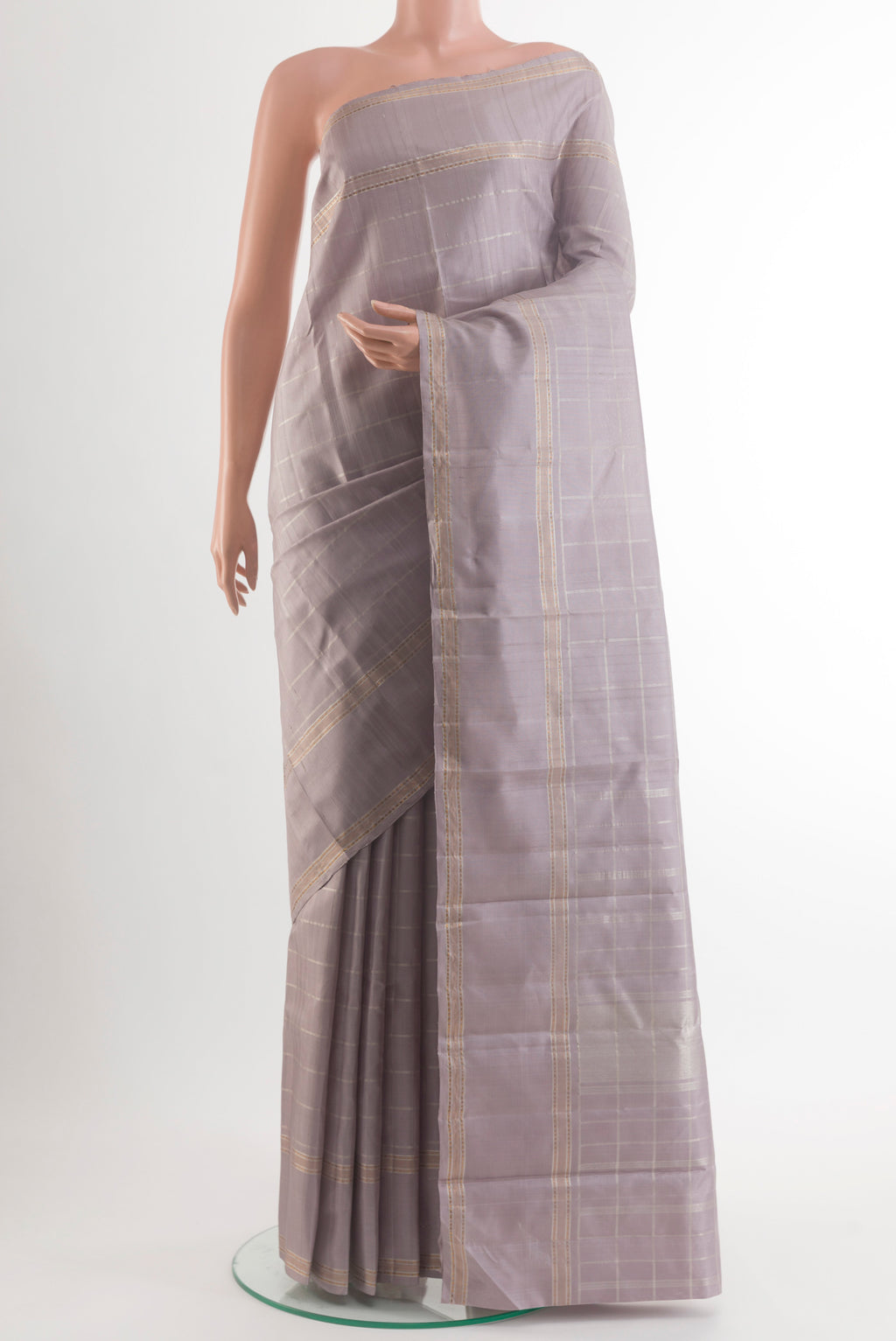 Pure Silk Grey Kanchipuram Saree with Checked design on the body and Zari Border.  displayed on a mannequin