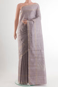 Pure Silk Grey Kanchipuram Saree with Checked design on the body and Zari Border.  displayed on a mannequin