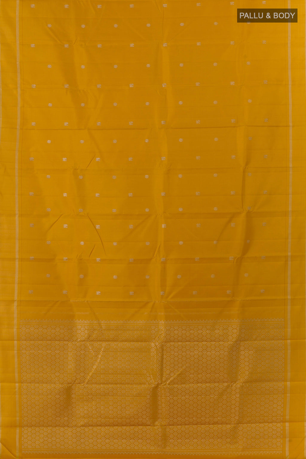 Flat view of Pure Silk Mustard Kanchipuram Saree with Zari Butta on the body and Zari Border. 
